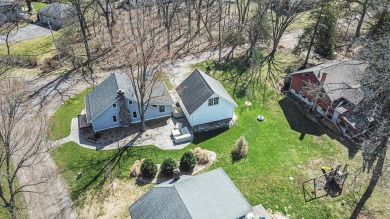 Nestled in a picturesque setting, this adorable home offers on Inverness Country Club in Michigan - for sale on GolfHomes.com, golf home, golf lot