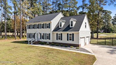 Welcome home to 4804 Burning Tree Lane North, a stately home set on Wilson Country Club in North Carolina - for sale on GolfHomes.com, golf home, golf lot