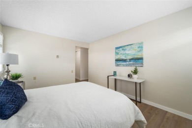 Private and move-in ready 2 bedroom 2 bathroom upstairs unit in on Leisure World Seal Beach Golf Course in California - for sale on GolfHomes.com, golf home, golf lot