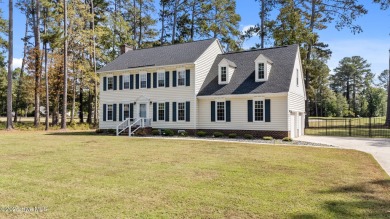 Welcome home to 4804 Burning Tree Lane North, a stately home set on Wilson Country Club in North Carolina - for sale on GolfHomes.com, golf home, golf lot