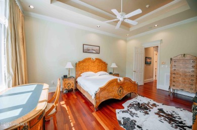 This exquisite brick home is tucked away on a cul-de-sac within on Pinewild Country Club of Pinehurst in North Carolina - for sale on GolfHomes.com, golf home, golf lot