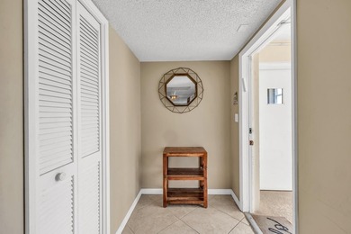Price Improvement! Rarely available 3-bedroom corner unit in on Palm-Aire Country Club and Resort - The Oaks in Florida - for sale on GolfHomes.com, golf home, golf lot