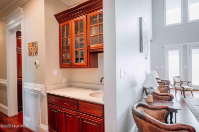 This exquisite brick home is tucked away on a cul-de-sac within on Pinewild Country Club of Pinehurst in North Carolina - for sale on GolfHomes.com, golf home, golf lot