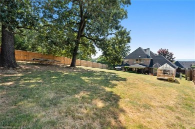 Welcome to this beautiful 4-bedroom, 2.5-bath home perfectly on Eagle Crest Golf Course in Arkansas - for sale on GolfHomes.com, golf home, golf lot