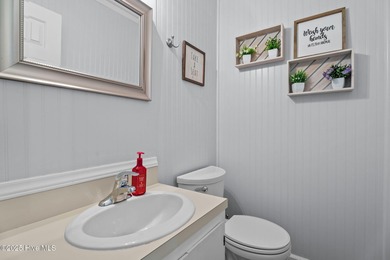 Welcome home to 4804 Burning Tree Lane North, a stately home set on Wilson Country Club in North Carolina - for sale on GolfHomes.com, golf home, golf lot