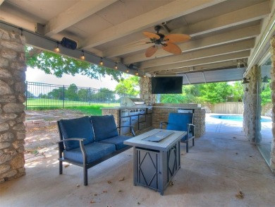 Step into timeless elegance with this beautiful mid-century on The Greens Country Club in Oklahoma - for sale on GolfHomes.com, golf home, golf lot