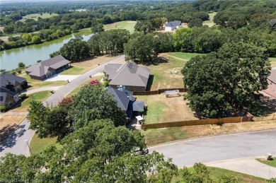 Welcome to this beautiful 4-bedroom, 2.5-bath home perfectly on Eagle Crest Golf Course in Arkansas - for sale on GolfHomes.com, golf home, golf lot