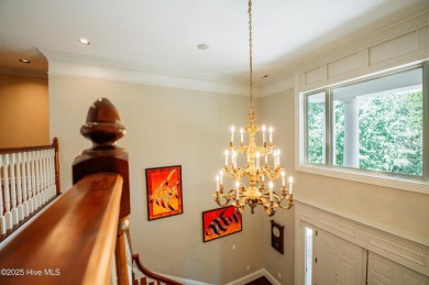 This exquisite brick home is tucked away on a cul-de-sac within on Pinewild Country Club of Pinehurst in North Carolina - for sale on GolfHomes.com, golf home, golf lot