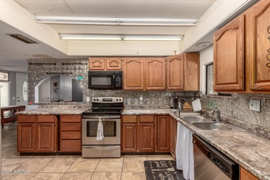 Discover this charming  2-bedroom gem with unlimited potential on Pebblebrook Golf Course in Arizona - for sale on GolfHomes.com, golf home, golf lot