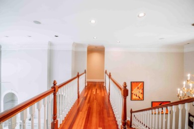 This exquisite brick home is tucked away on a cul-de-sac within on Pinewild Country Club of Pinehurst in North Carolina - for sale on GolfHomes.com, golf home, golf lot