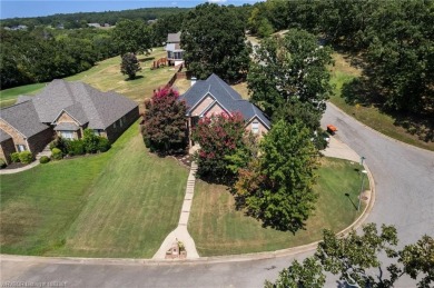 Welcome to this beautiful 4-bedroom, 2.5-bath home perfectly on Eagle Crest Golf Course in Arkansas - for sale on GolfHomes.com, golf home, golf lot