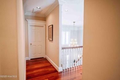 This exquisite brick home is tucked away on a cul-de-sac within on Pinewild Country Club of Pinehurst in North Carolina - for sale on GolfHomes.com, golf home, golf lot
