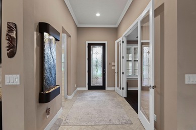 Immaculate custom-built lakefront home in the gated Copperleaf on Evergreen Club in Florida - for sale on GolfHomes.com, golf home, golf lot