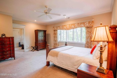 This exquisite brick home is tucked away on a cul-de-sac within on Pinewild Country Club of Pinehurst in North Carolina - for sale on GolfHomes.com, golf home, golf lot