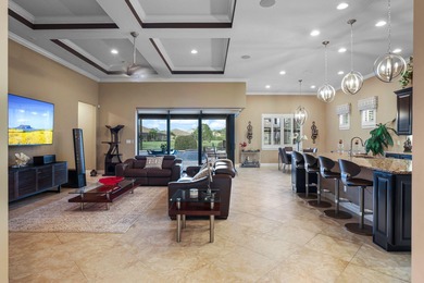 Immaculate custom-built lakefront home in the gated Copperleaf on Evergreen Club in Florida - for sale on GolfHomes.com, golf home, golf lot