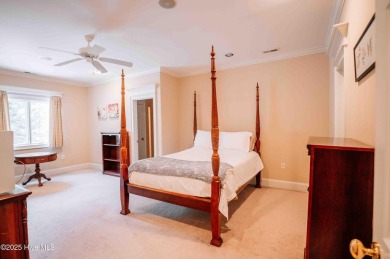 This exquisite brick home is tucked away on a cul-de-sac within on Pinewild Country Club of Pinehurst in North Carolina - for sale on GolfHomes.com, golf home, golf lot
