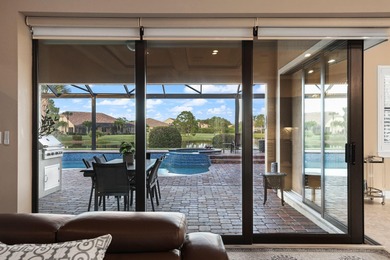 Immaculate custom-built lakefront home in the gated Copperleaf on Evergreen Club in Florida - for sale on GolfHomes.com, golf home, golf lot