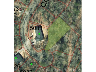 Discover the perfect opportunity to build your dream home on on Carolina Trace Country Club in North Carolina - for sale on GolfHomes.com, golf home, golf lot