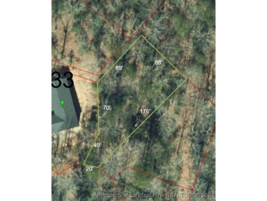Discover the perfect opportunity to build your dream home on on Carolina Trace Country Club in North Carolina - for sale on GolfHomes.com, golf home, golf lot