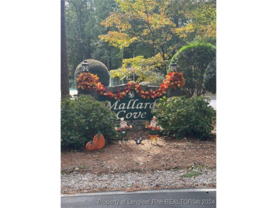 Discover the perfect opportunity to build your dream home on on Carolina Trace Country Club in North Carolina - for sale on GolfHomes.com, golf home, golf lot