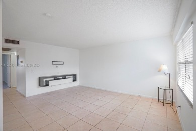 This is THE LOWEST PRICE 2 Bedroom Move in Ready in Century on Flamingo Lakes Country Club in Florida - for sale on GolfHomes.com, golf home, golf lot