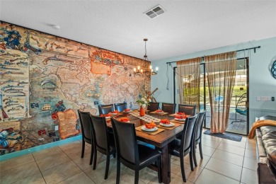 Step into the magical realm of this beautifully themed on The Oasis Club at Champions Gate in Florida - for sale on GolfHomes.com, golf home, golf lot