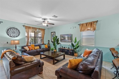 Step into the magical realm of this beautifully themed on The Oasis Club at Champions Gate in Florida - for sale on GolfHomes.com, golf home, golf lot