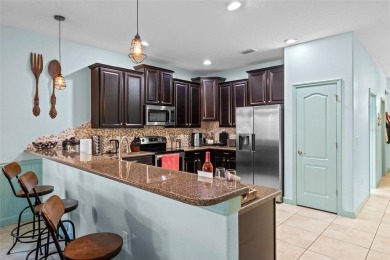 Step into the magical realm of this beautifully themed on The Oasis Club at Champions Gate in Florida - for sale on GolfHomes.com, golf home, golf lot