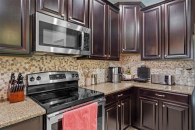 Step into the magical realm of this beautifully themed on The Oasis Club at Champions Gate in Florida - for sale on GolfHomes.com, golf home, golf lot