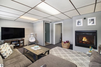 Discover comfort and convenience in this well-maintained on Bear Lake Highlands Golf Course in Michigan - for sale on GolfHomes.com, golf home, golf lot