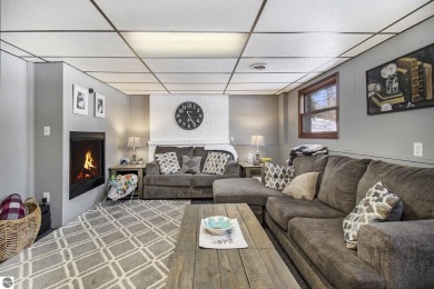 Discover comfort and convenience in this well-maintained on Bear Lake Highlands Golf Course in Michigan - for sale on GolfHomes.com, golf home, golf lot