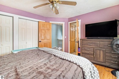 Discover comfort and convenience in this well-maintained on Bear Lake Highlands Golf Course in Michigan - for sale on GolfHomes.com, golf home, golf lot