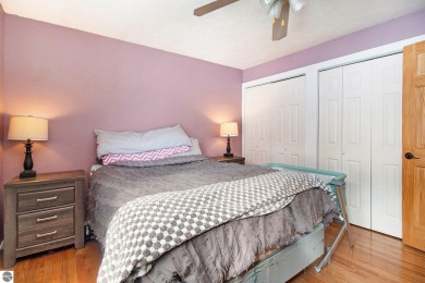 Discover comfort and convenience in this well-maintained on Bear Lake Highlands Golf Course in Michigan - for sale on GolfHomes.com, golf home, golf lot