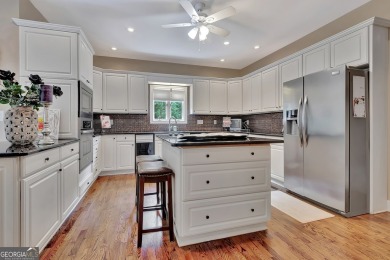 Welcome to this stunning and spacious home located in on Braelinn Golf Club in Georgia - for sale on GolfHomes.com, golf home, golf lot