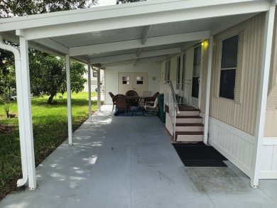 Charming fisherman's retreat in waterfront community of Seminole on KOA Campground and Golf Resort in Florida - for sale on GolfHomes.com, golf home, golf lot