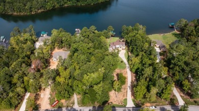 Lakefront Living at Its Finest - Nestled on a picturesque 1-acre on The Patriot Golf Club At Grand Harbor in South Carolina - for sale on GolfHomes.com, golf home, golf lot