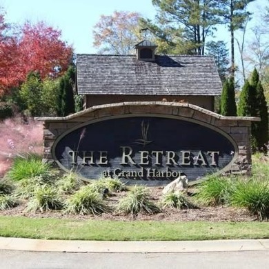 Lakefront Living at Its Finest - Nestled on a picturesque 1-acre on The Patriot Golf Club At Grand Harbor in South Carolina - for sale on GolfHomes.com, golf home, golf lot