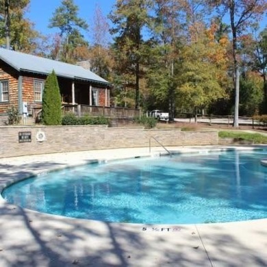 Lakefront Living at Its Finest - Nestled on a picturesque 1-acre on The Patriot Golf Club At Grand Harbor in South Carolina - for sale on GolfHomes.com, golf home, golf lot