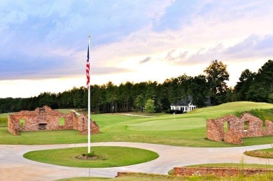 Lakefront Living at Its Finest - Nestled on a picturesque 1-acre on The Patriot Golf Club At Grand Harbor in South Carolina - for sale on GolfHomes.com, golf home, golf lot