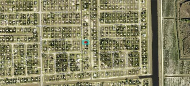 Excellent opportunity backed up to a canal and in an area with on Mirror Lakes Golf Club in Florida - for sale on GolfHomes.com, golf home, golf lot