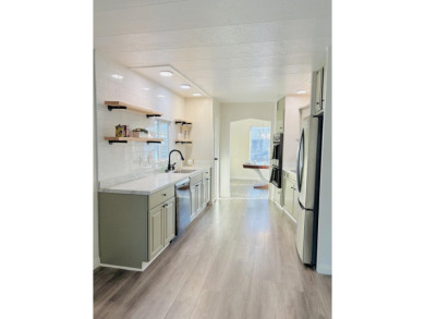 Beautifully Updated Double-Wide in the 55+ Community of Tri Palm on The Club At Shenandoah Springs in California - for sale on GolfHomes.com, golf home, golf lot