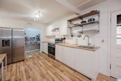 Welcome to Million Dollar Lakes. This 3-bedroom, 1.5-bath home on Lakeview Country Club in Alabama - for sale on GolfHomes.com, golf home, golf lot