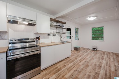 Welcome to Million Dollar Lakes. This 3-bedroom, 1.5-bath home on Lakeview Country Club in Alabama - for sale on GolfHomes.com, golf home, golf lot