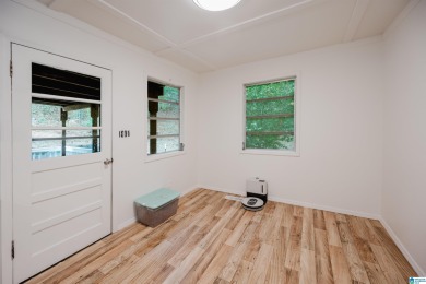 Welcome to Million Dollar Lakes. This 3-bedroom, 1.5-bath home on Lakeview Country Club in Alabama - for sale on GolfHomes.com, golf home, golf lot