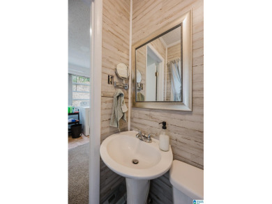 Welcome to Million Dollar Lakes. This 3-bedroom, 1.5-bath home on Lakeview Country Club in Alabama - for sale on GolfHomes.com, golf home, golf lot