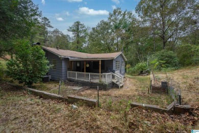 Welcome to Million Dollar Lakes. This 3-bedroom, 1.5-bath home on Lakeview Country Club in Alabama - for sale on GolfHomes.com, golf home, golf lot