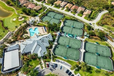 Welcome to your dream waterfront carriage home in the on Colonial Country Club in Florida - for sale on GolfHomes.com, golf home, golf lot