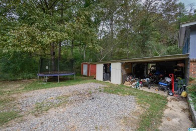 Welcome to Million Dollar Lakes. This 3-bedroom, 1.5-bath home on Lakeview Country Club in Alabama - for sale on GolfHomes.com, golf home, golf lot