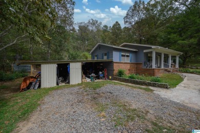 Welcome to Million Dollar Lakes. This 3-bedroom, 1.5-bath home on Lakeview Country Club in Alabama - for sale on GolfHomes.com, golf home, golf lot