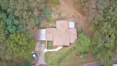 Welcome to Million Dollar Lakes. This 3-bedroom, 1.5-bath home on Lakeview Country Club in Alabama - for sale on GolfHomes.com, golf home, golf lot